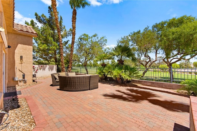 9136 Eagle Ridge Dr, Las Vegas, NV 89134 - fenced backyard featuring a patio area and outdoor lounge area
