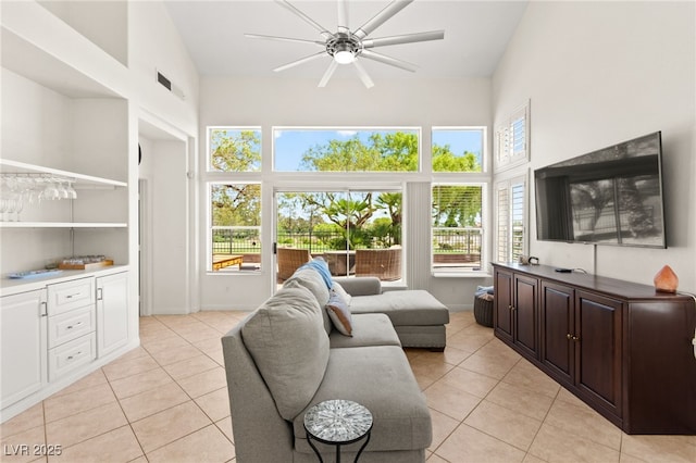 9136 Eagle Ridge Dr, Las Vegas, NV 89134 - living area with a towering ceiling, light tile patterned floors, and ceiling fan