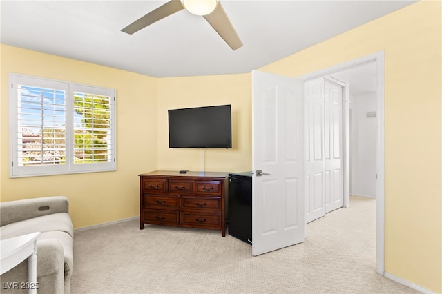 9136 Eagle Ridge Dr, Las Vegas, NV 89134 - sitting room with ceiling fan and light carpet