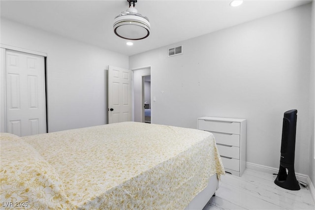 3361 Horizon St, Las Vegas, NV 89121 - bedroom featuring light marble finish floors, recessed lighting, and a closet