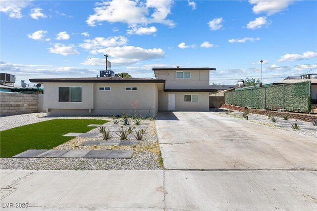 3361 Horizon St, Las Vegas, NV 89121 - view of front of property with stucco siding and concrete driveway