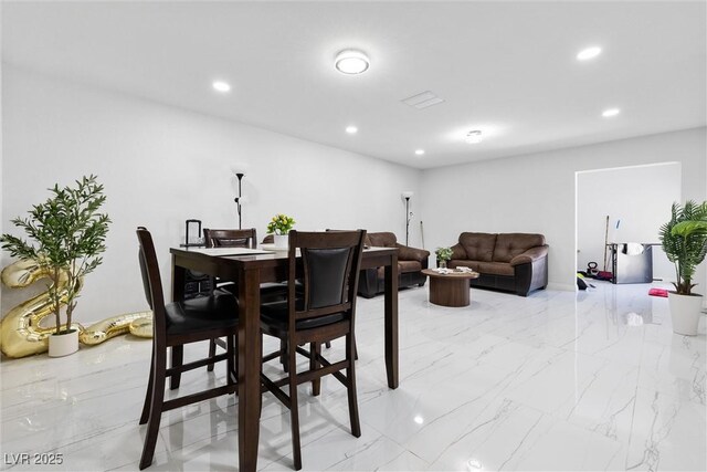 3361 Horizon St, Las Vegas, NV 89121 - dining area with recessed lighting and light marble finish flooring