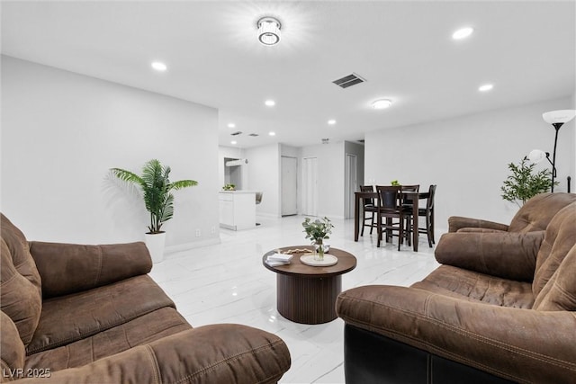 3361 Horizon St, Las Vegas, NV 89121 - living room featuring recessed lighting and light marble finish flooring