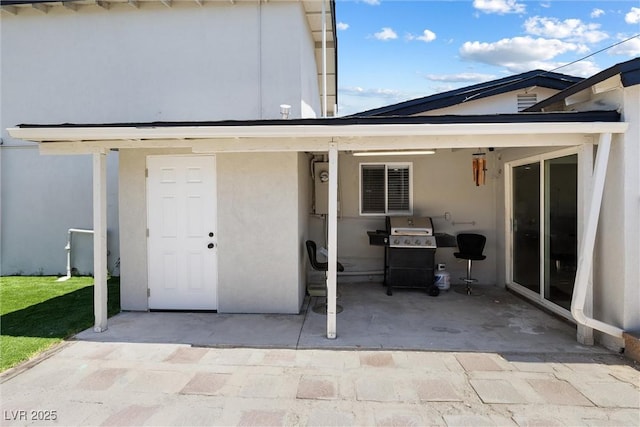 3361 Horizon St, Las Vegas, NV 89121 - rear view of property with stucco siding and a patio area