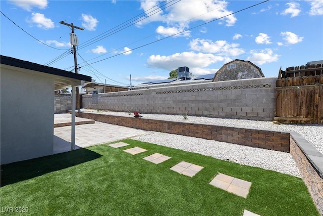 3361 Horizon St, Las Vegas, NV 89121 - fenced backyard with a patio
