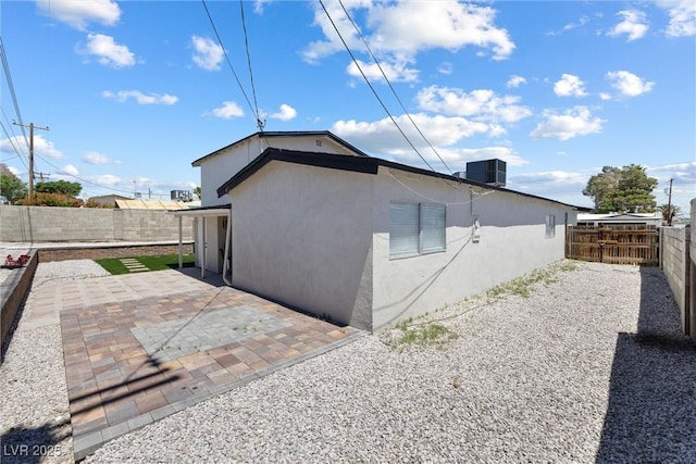 3361 Horizon St, Las Vegas, NV 89121 - view of side of property with a patio area, a fenced backyard, and stucco siding