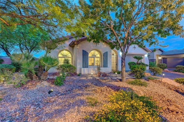 212 Florio Ct, Las Vegas, NV 89138 - mediterranean / spanish-style home with a garage and stucco siding