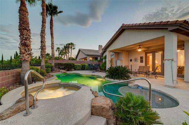 212 Florio Ct, Las Vegas, NV 89138 - view of pool featuring a patio area, a fenced backyard, ceiling fan, and a pool with connected hot tub