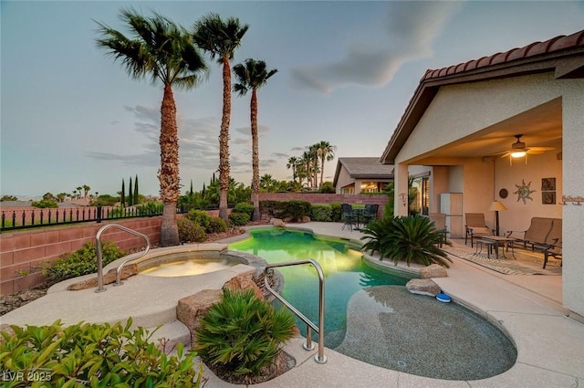 212 Florio Ct, Las Vegas, NV 89138 - view of swimming pool with a patio, a ceiling fan, a fenced backyard, and a pool with connected hot tub