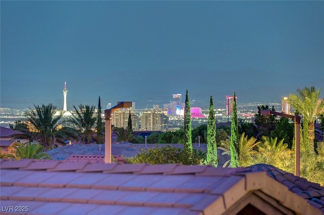 212 Florio Ct, Las Vegas, NV 89138 - patio at night featuring a view of city lights