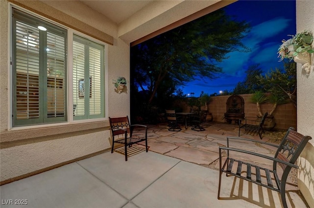 212 Florio Ct, Las Vegas, NV 89138 - fenced backyard with a patio and outdoor dining area