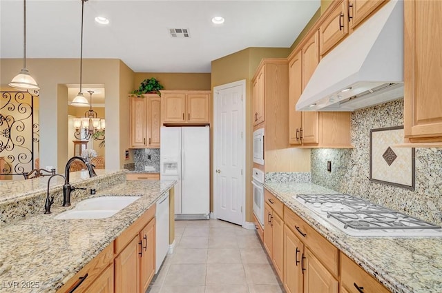 212 Florio Ct, Las Vegas, NV 89138 - kitchen featuring under cabinet range hood, white appliances, light brown cabinetry, and recessed lighting