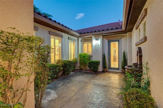 212 Florio Ct, Las Vegas, NV 89138 - entrance to property with a patio, stucco siding, and a tiled roof