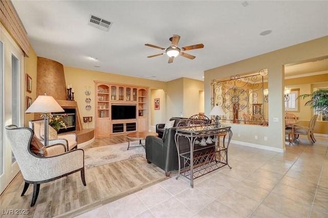 212 Florio Ct, Las Vegas, NV 89138 - tiled living area featuring a ceiling fan and built in features