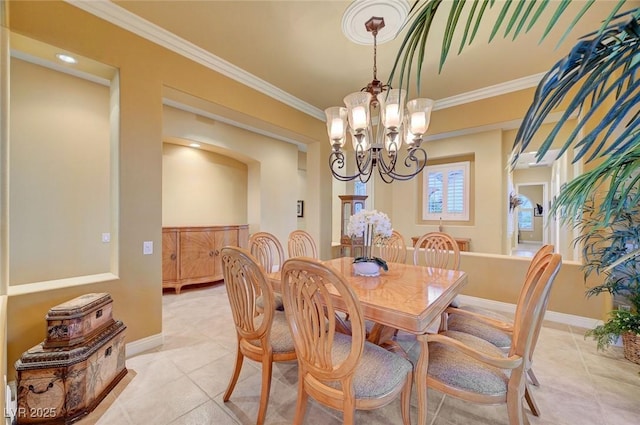 212 Florio Ct, Las Vegas, NV 89138 - dining space featuring a chandelier, ornamental molding, and light tile patterned floors