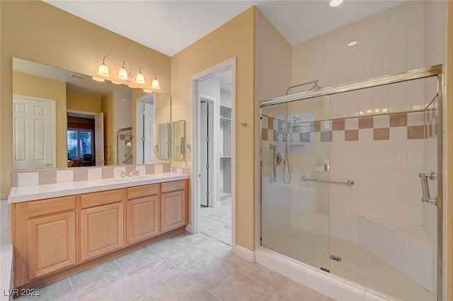 212 Florio Ct, Las Vegas, NV 89138 - bathroom featuring a shower stall, tile patterned floors, and vanity