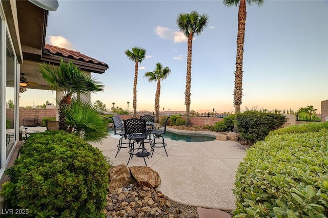 212 Florio Ct, Las Vegas, NV 89138 - patio terrace at dusk featuring a patio area