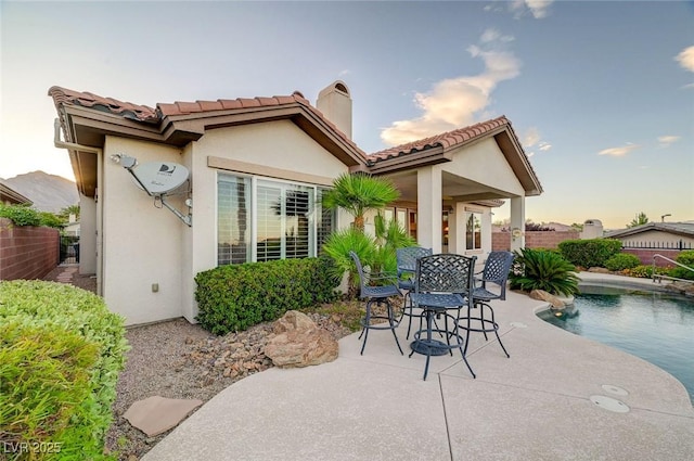 212 Florio Ct, Las Vegas, NV 89138 - patio terrace at dusk featuring a patio area