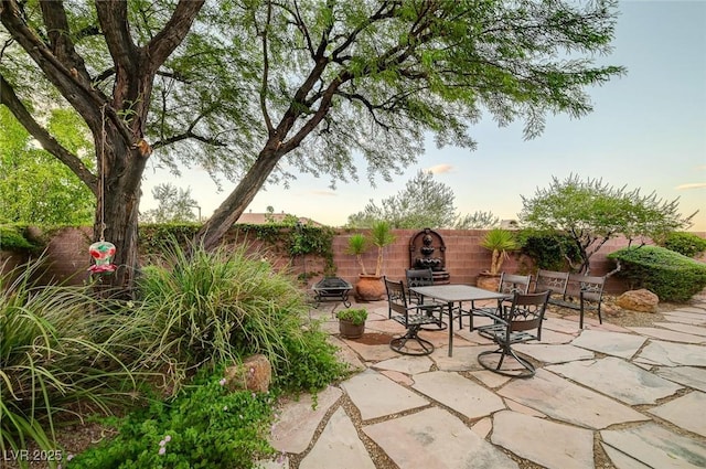 212 Florio Ct, Las Vegas, NV 89138 - fenced backyard featuring a patio area and outdoor dining area