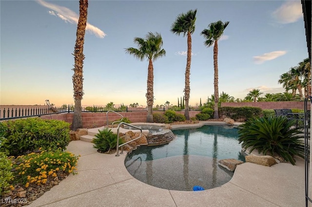 212 Florio Ct, Las Vegas, NV 89138 - pool at dusk with a pool with connected hot tub