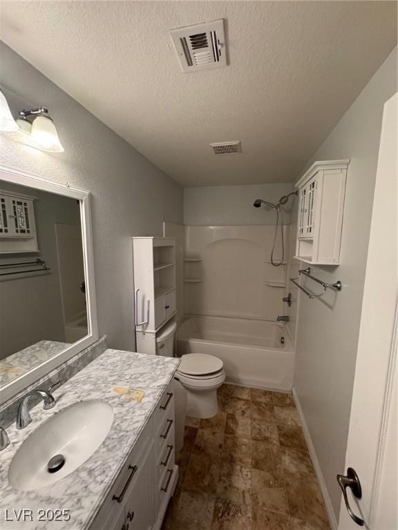 32 Yellow Peak Ave, North Las Vegas, NV 89031 - full bathroom with vanity, a textured ceiling, and tub / shower combination