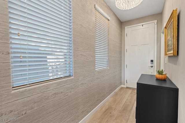 714 Rogue Wave St, Las Vegas, NV 89138 - doorway featuring light wood-style flooring and a chandelier