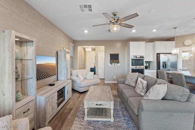 714 Rogue Wave St, Las Vegas, NV 89138 - living area with wood finished floors, ceiling fan, and recessed lighting