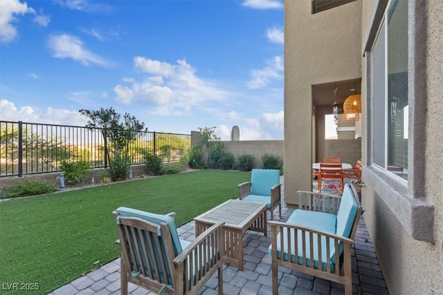 714 Rogue Wave St, Las Vegas, NV 89138 - fenced backyard featuring a patio area and outdoor lounge area
