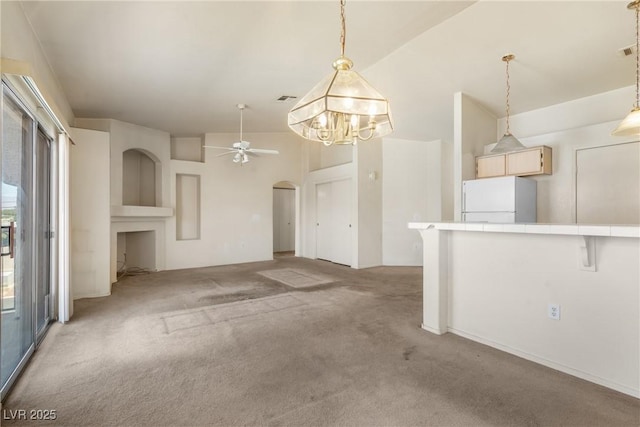 6201 E Lake Mead Blvd Unit 210, Las Vegas, NV 89156 - unfurnished living room with light colored carpet, arched walkways, and ceiling fan