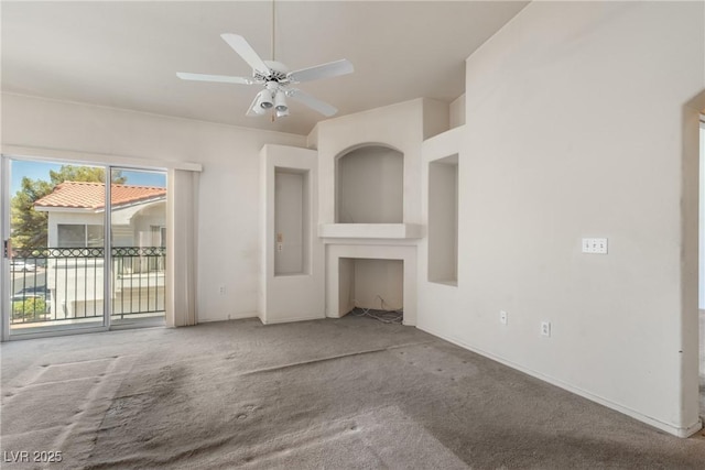 6201 E Lake Mead Blvd Unit 210, Las Vegas, NV 89156 - unfurnished living room with carpet flooring and ceiling fan