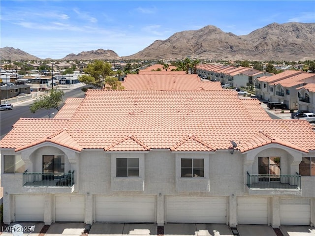 6201 E Lake Mead Blvd Unit 210, Las Vegas, NV 89156 - view of front of home featuring a tiled roof, a mountain view, and an attached garage