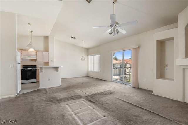 6201 E Lake Mead Blvd Unit 210, Las Vegas, NV 89156 - unfurnished living room with light carpet, a ceiling fan, and vaulted ceiling