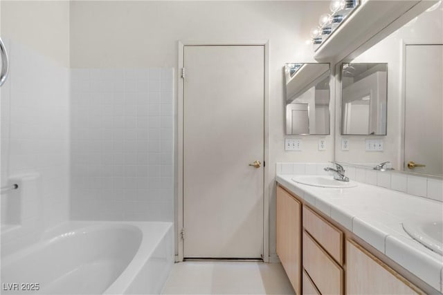 6201 E Lake Mead Blvd Unit 210, Las Vegas, NV 89156 - bathroom with double vanity and  shower combination