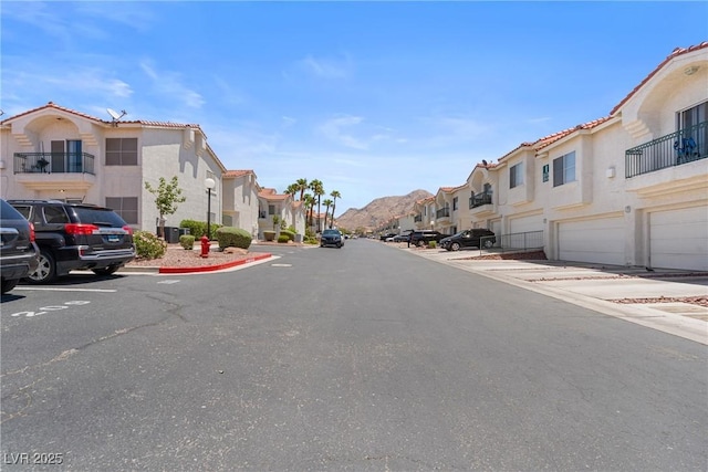 6201 E Lake Mead Blvd Unit 210, Las Vegas, NV 89156 - view of asphalt street with a residential view, curbs, and sidewalks