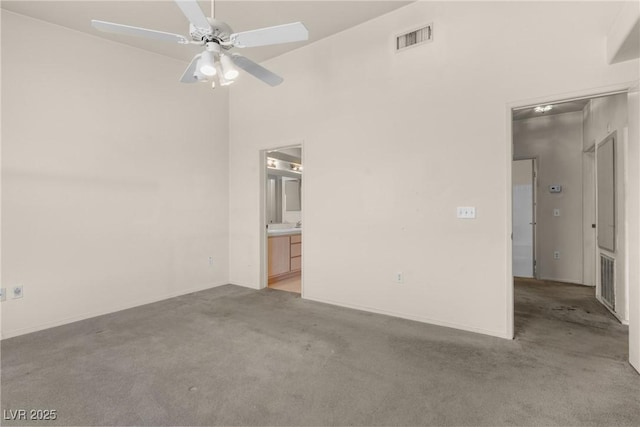 6201 E Lake Mead Blvd Unit 210, Las Vegas, NV 89156 - spare room featuring light carpet and a ceiling fan