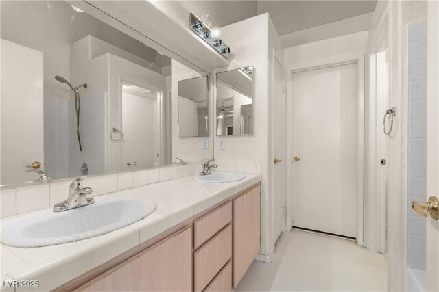 6201 E Lake Mead Blvd Unit 210, Las Vegas, NV 89156 - full bath with double vanity and tile patterned floors