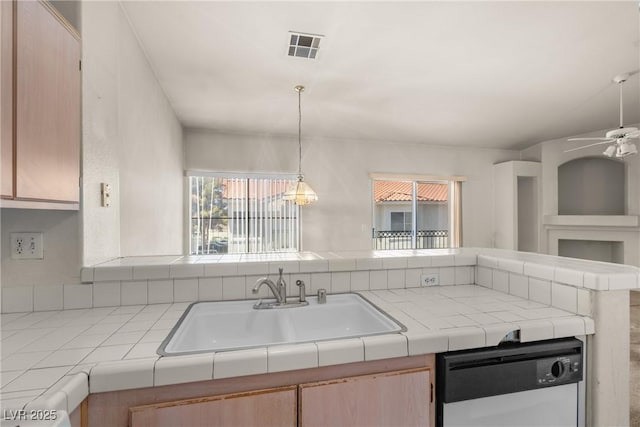 6201 E Lake Mead Blvd Unit 210, Las Vegas, NV 89156 - kitchen featuring dishwasher, a ceiling fan, light brown cabinetry, tile countertops, and open floor plan
