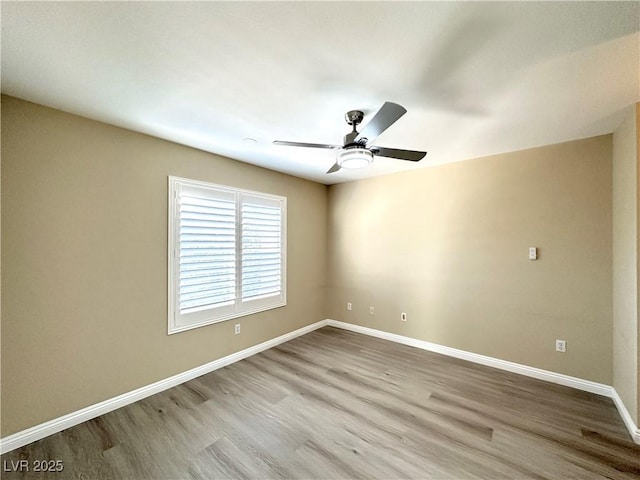 8070 W Russell Rd Unit 2070, Las Vegas, NV 89113 - empty room with wood finished floors and a ceiling fan