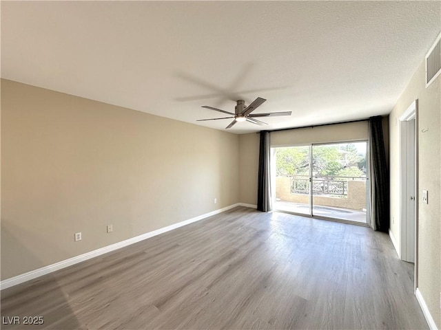 8070 W Russell Rd Unit 2070, Las Vegas, NV 89113 - unfurnished room featuring wood finished floors and ceiling fan