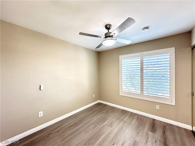 8070 W Russell Rd Unit 2070, Las Vegas, NV 89113 - unfurnished room featuring wood finished floors and a ceiling fan