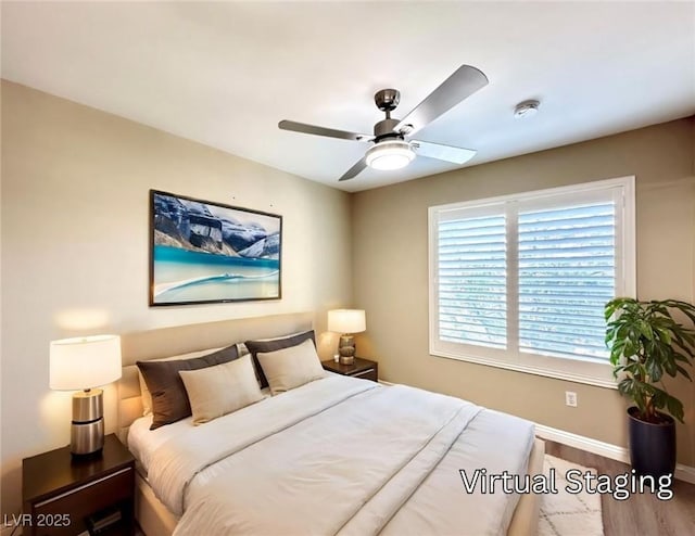 8070 W Russell Rd Unit 2070, Las Vegas, NV 89113 - bedroom with wood finished floors and a ceiling fan