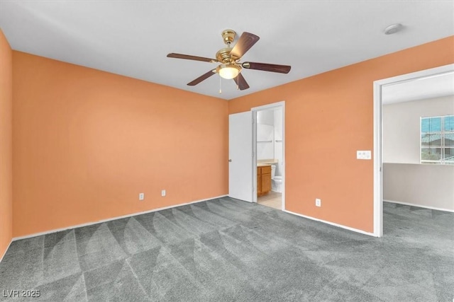 9948 Trailing Vine St, Las Vegas, NV 89183 - unfurnished bedroom with carpet flooring, a ceiling fan, a walk in closet, and ensuite bath