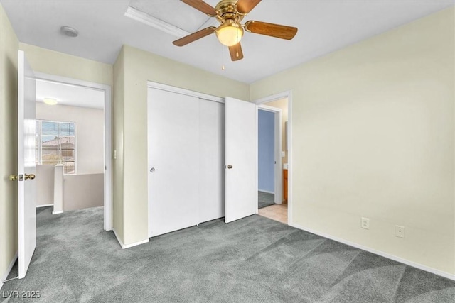 9948 Trailing Vine St, Las Vegas, NV 89183 - unfurnished bedroom featuring carpet, a closet, and a ceiling fan