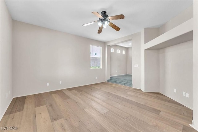 9948 Trailing Vine St, Las Vegas, NV 89183 - spare room with a ceiling fan and light wood finished floors