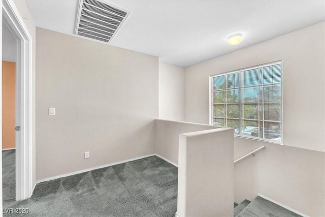 9948 Trailing Vine St, Las Vegas, NV 89183 - corridor with an upstairs landing and carpet