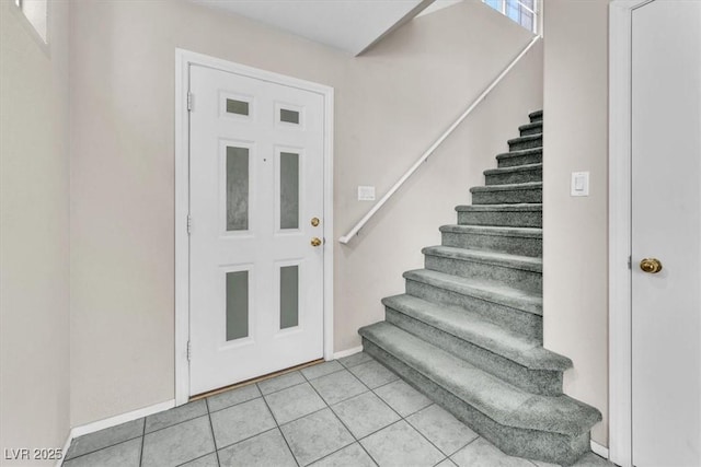 9948 Trailing Vine St, Las Vegas, NV 89183 - foyer featuring stairs and light tile patterned floors