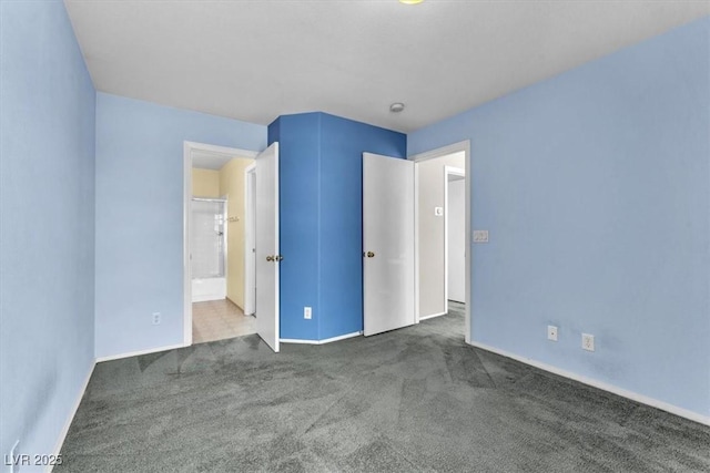 9948 Trailing Vine St, Las Vegas, NV 89183 - unfurnished bedroom with carpet floors and baseboards