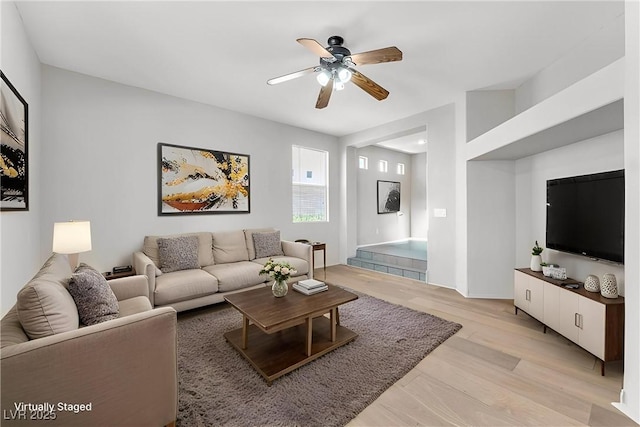 9948 Trailing Vine St, Las Vegas, NV 89183 - living area with a ceiling fan and light wood-style floors