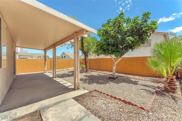 9948 Trailing Vine St, Las Vegas, NV 89183 - fenced backyard featuring a patio
