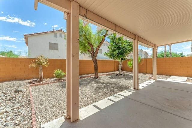 9948 Trailing Vine St, Las Vegas, NV 89183 - fenced backyard with a patio
